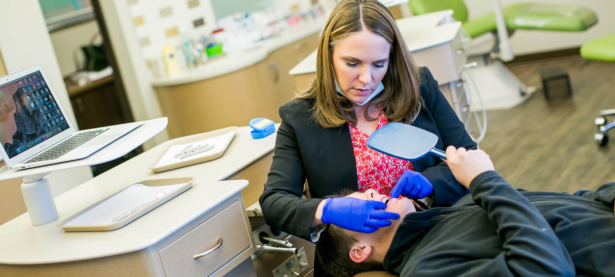 Katie Graber adjusting braces